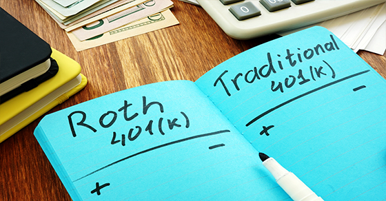 Pieces of paper comparing Roth and Traditional 401k's
